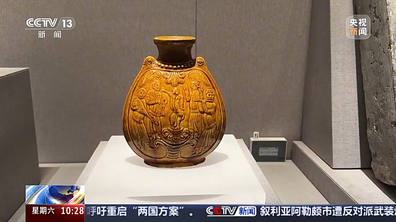文化中國行丨北齊黃釉扁壺 千年前的“胡騰舞”是啥模樣？